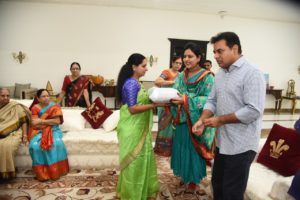 TRS MP Kavitha Tying Rakhi to Minister KT Rama Rao (2)