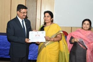 B P Acharya, IAS, Spl Chief Secretary to Govt and DG , Dr MCR HRD Institute giving away participation certificate to one of the officers who attended the Training Program for Master Trainers for Ce