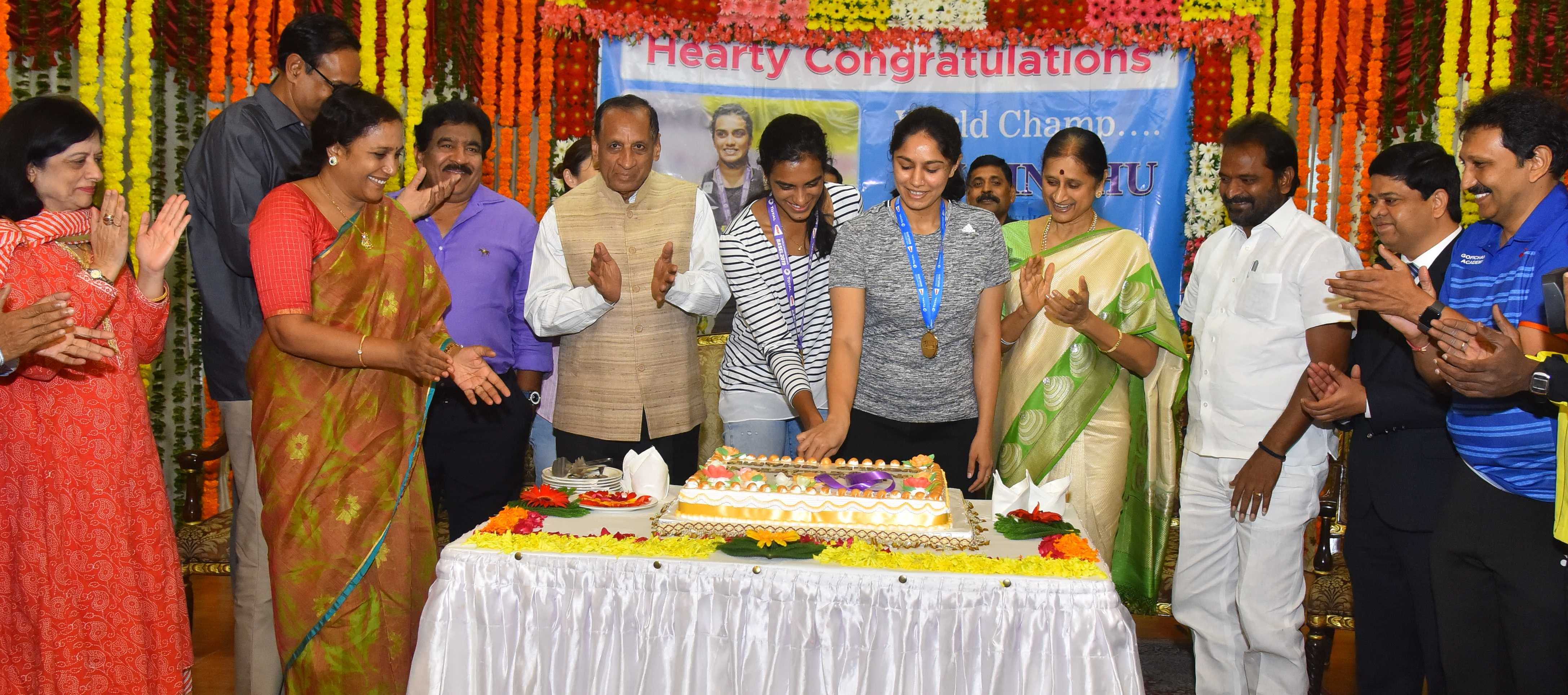 Governor ESL Narasimhan Presenting Memento to Gold Medallist PV Sindhu